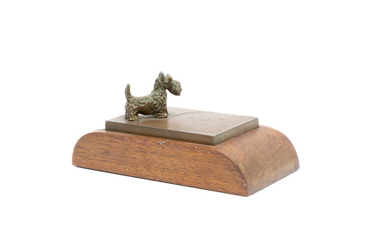 Side view of vintage 1930s spaniel dog bronze-plated and wooden paperweight