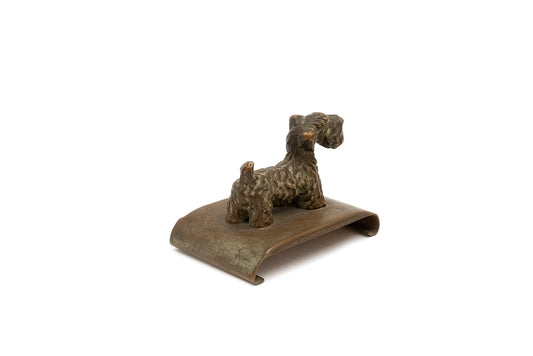 Side view of vintage bronze-plated spaniel ink blotter holder