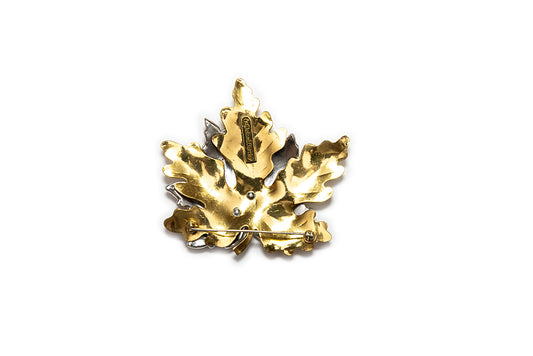Back view of large maple leaf brooch with mark "McClelland Barclay"