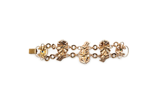 back view of McClelland Barclay gold-plated oak leaf chain link bracelet