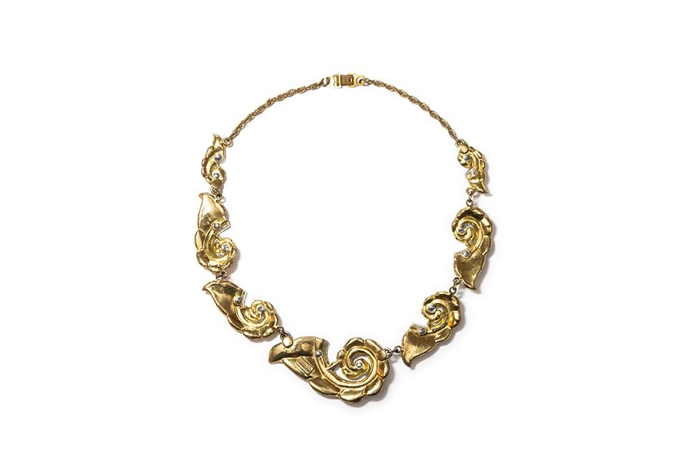 Back view of McClelland Barclay gold-plated choker necklace with swirl design
