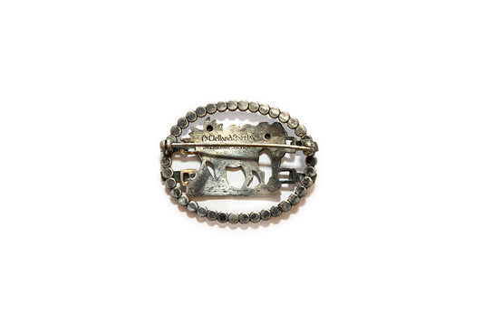 Back view of sterling silver elk brooch with "McClelland Barclay" and "STERLING SILVER" marks