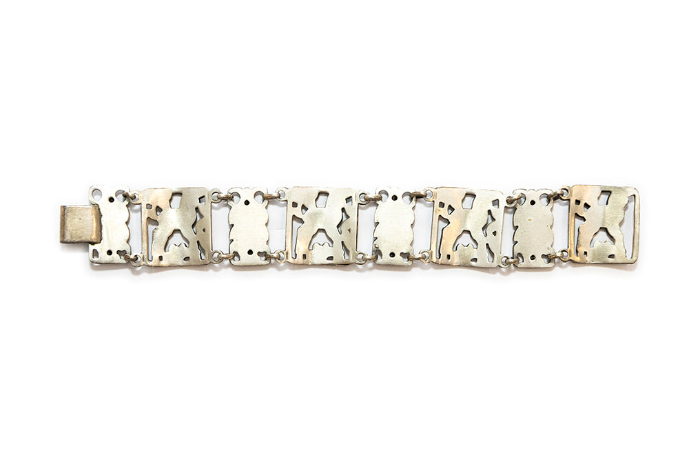 back view of vintage McClelland Barclay sterling silver lamb bracelet shows solid back on links; this item is unmarked