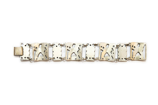 back view of vintage McClelland Barclay sterling silver lamb bracelet shows solid back on links; this item is unmarked