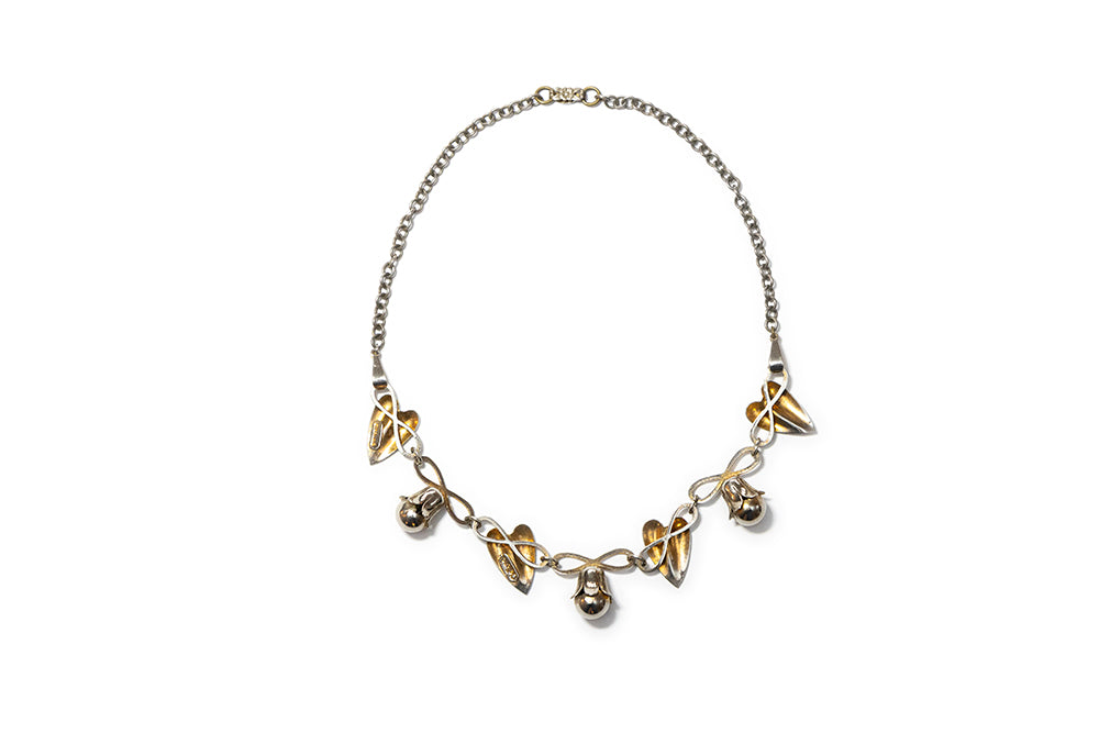 back view of vintage sterling silver choker necklace with flower buds and leaves with McClelland Barclay and STERLING SILVER plaques