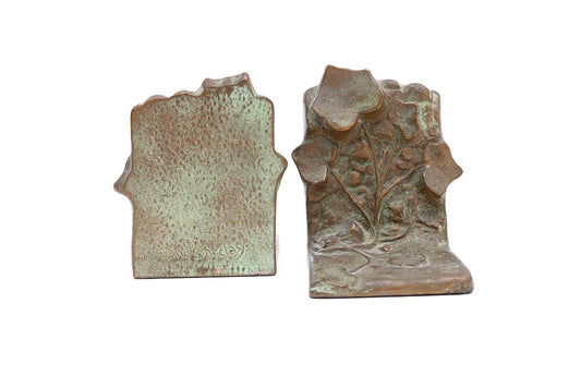 Signed Art Deco plated bronze and "McClelland Barclay green" bookends made in the 1930s, front and back views