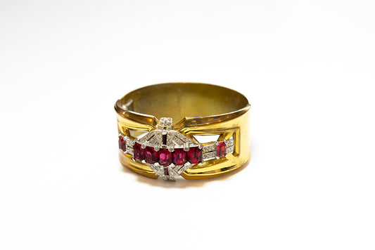side view of vintage Art Deco hinged cuff bracelet by McClelland Barclay embellished with red and clear rhinestones