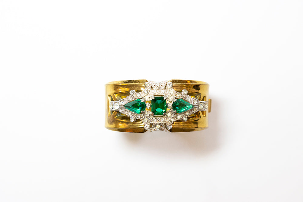 McClelland Barclay Art Deco hinged cuff bracelet with green and clear rhinestones