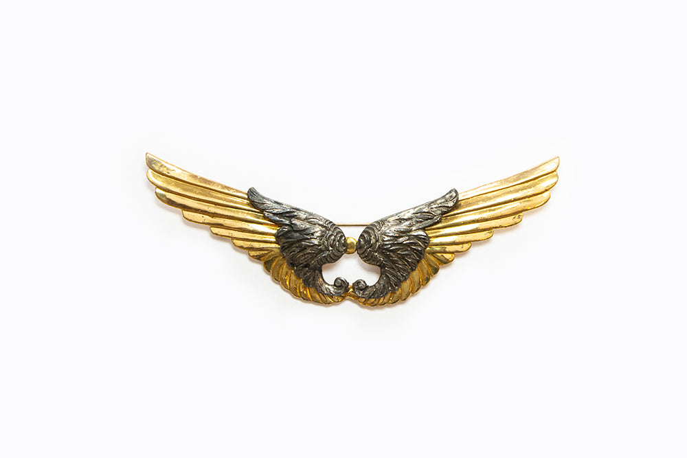 McClelland Barclay Art Deco double wings brooch in gold tone with silver tone accent
