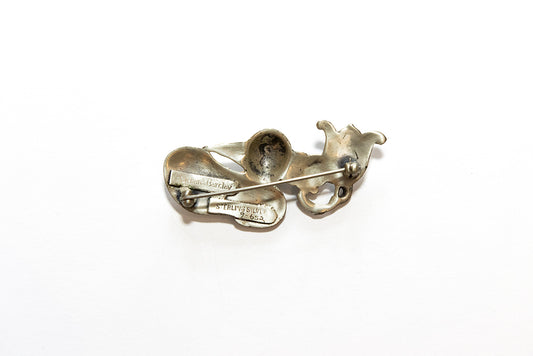 back view of vintage Art Deco Depression Era political themed sterling silver brooch by McClelland Barclay