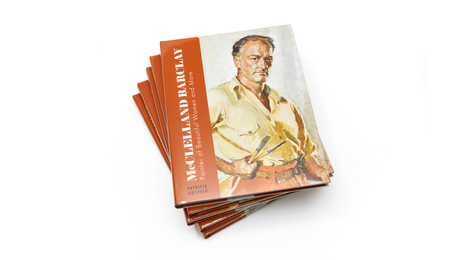 a stack of the new hardcover illustrated biography, "McClelland Barclay: Painter of Beautiful Women and More" by Patricia Gostick
