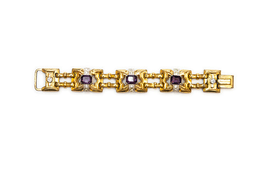 Late Art Deco gold plated with purple and clear rhinestone bracelet with McClelland Barclay mark