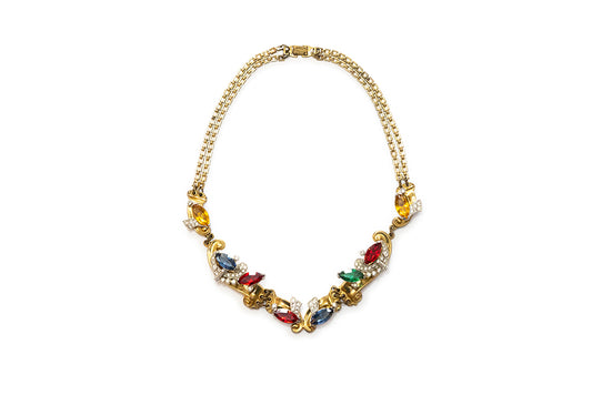 rare MCCLELLAND BARCLAY Art Moderne gold plated with red, green, blue and clear rhinestone swirls necklace c. 1940