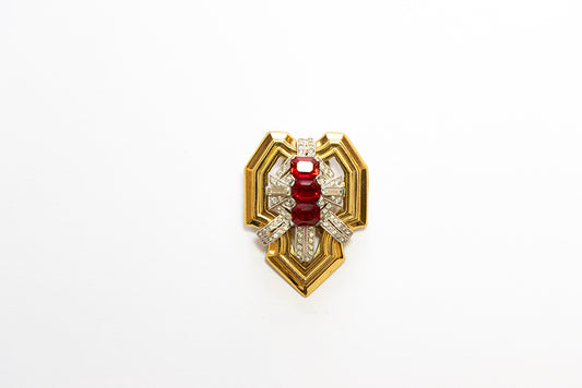 MCCLELLAND BARCLAY Art Deco gold plated with red and clear rhinestones small shield shaped dress clip