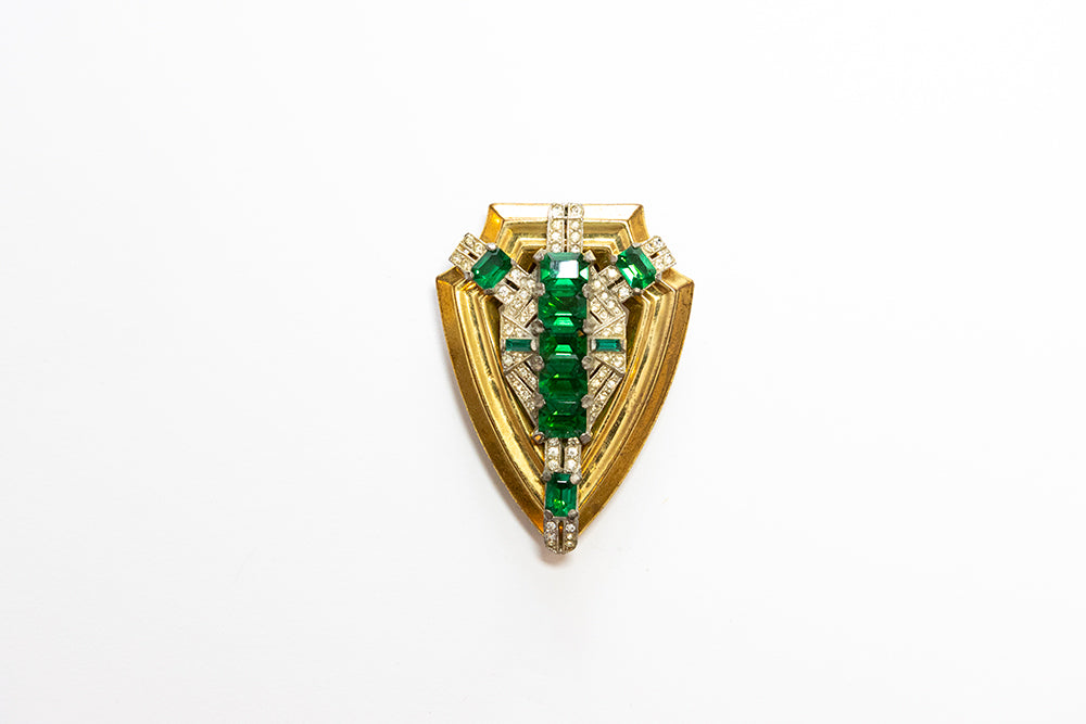 McCLELLAND BARCLAY Gold Plated Green and Clear Stones Shield Dress Clip