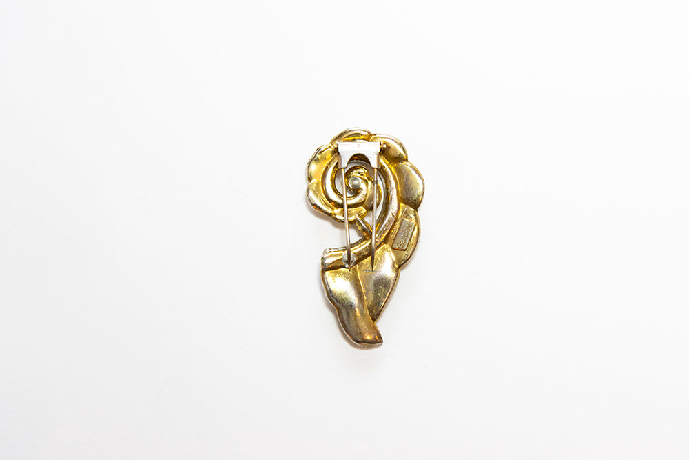 Back view shows double prongs and Barclay© mark of swirl fur or dress clip