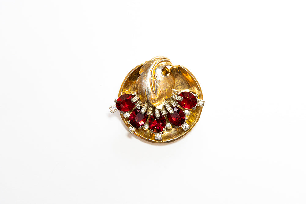 Vintage McClelland Barclay gold-plated round leaf brooch with red  and clear rhinestones