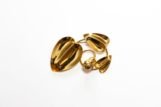 Vintage sterling vermeil McClelland Barclay brooch with three heart-shaped leaves and a flower bud 