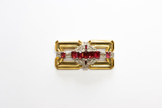 Gold plated rectangular brooch with red and clear rhinestones