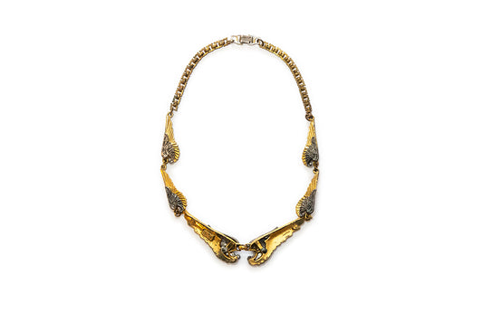 back view of 1941 McClelland Barclay vintage double wings necklace with maker plaque