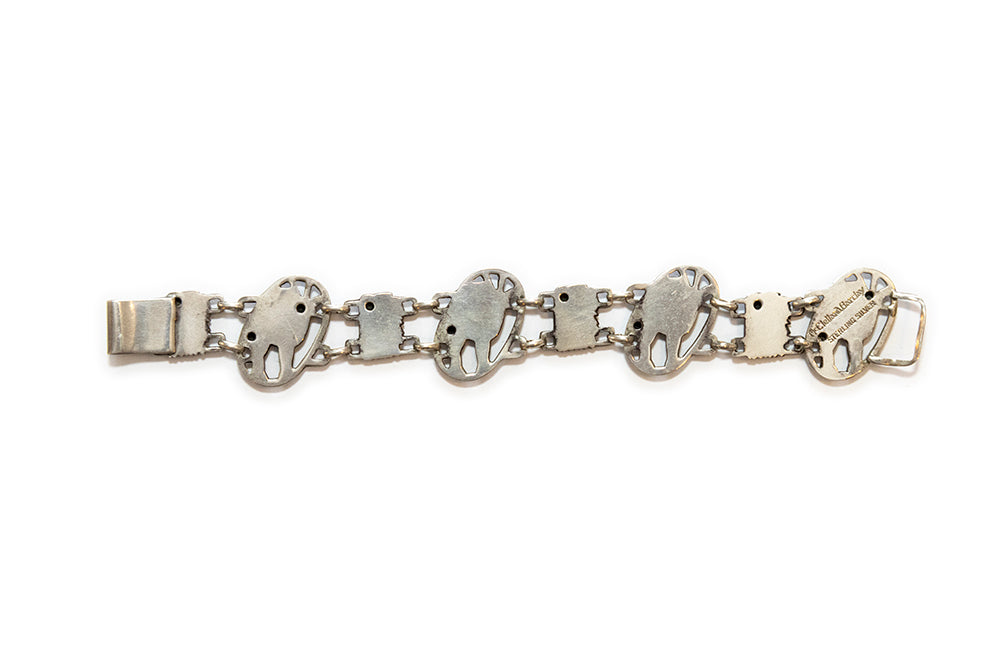 Back of the deer and pinecone bracelet shows the makers marks: "McClelland Barclay STERLING SILVER"