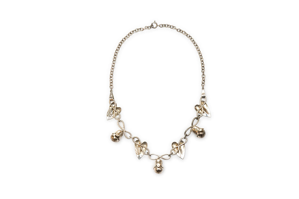 back view of McClelland Barclay vintage sterling vermeil necklace with leaves and flower buds