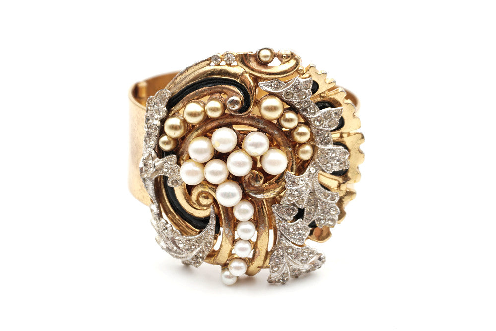 very rare collectible McClelland Barclay gold-plated cuff bracelet encrusted with rhinestones and pearls and accented with black enamel