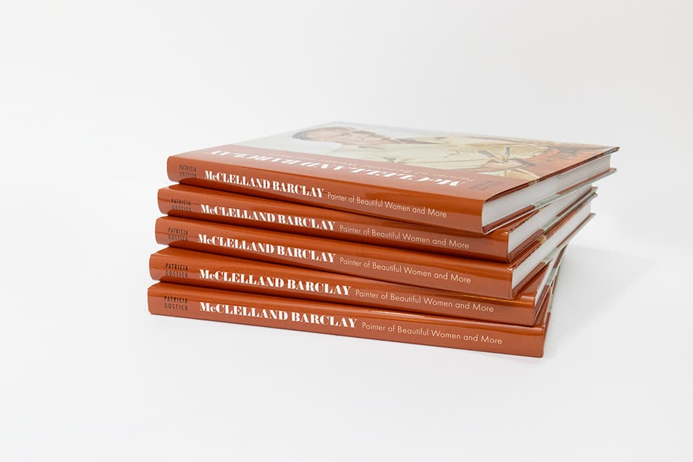 A stack of the illustrated artist biography by Patricia Gostick: McClelland Barclay; Painter of Beautiful Women and More