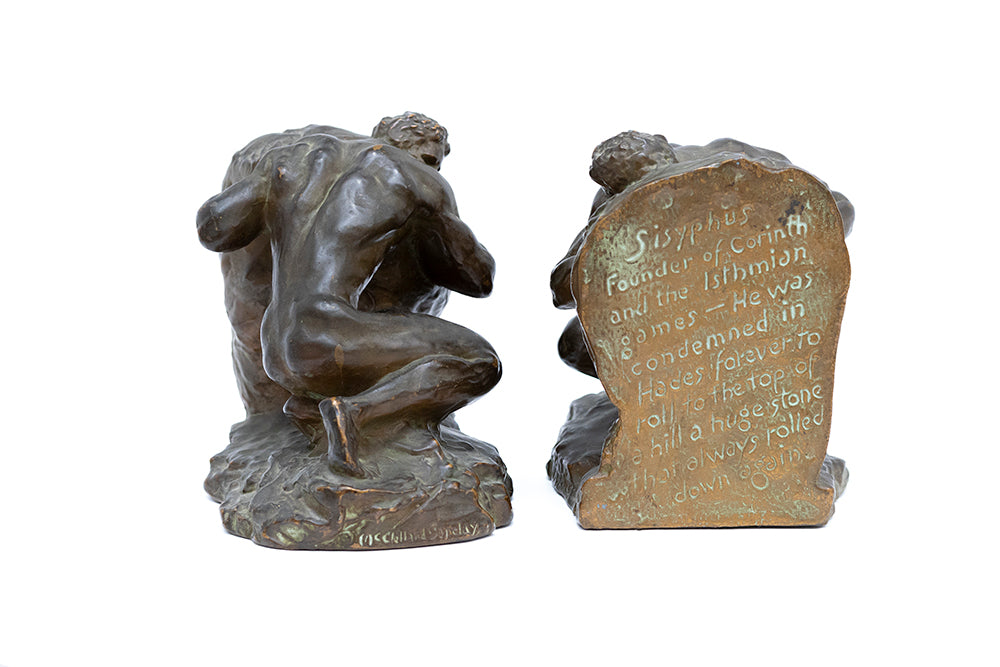 Front and back view pair of bronze plated nude Sisyphus bookends by McClelland Barclay Art Products from the 1930s. The back is carved of the Greek mythology story of  Sisyphus, founder of Corinthia when he tries to roll a huge boulder uphill. 