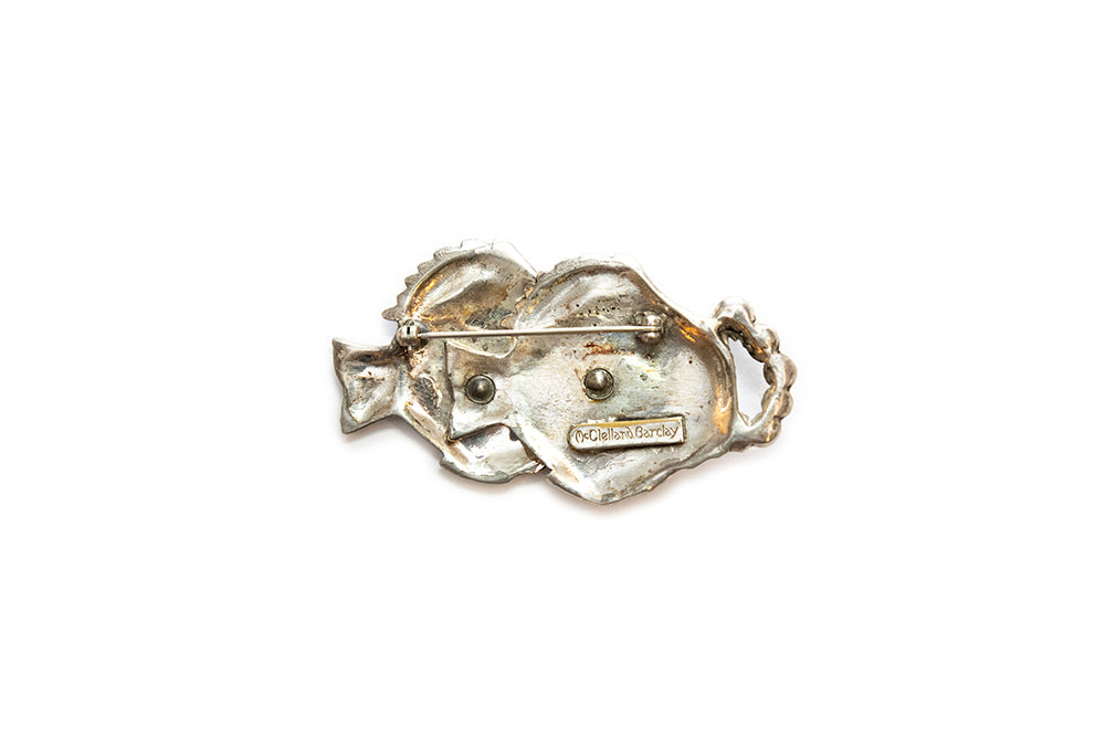 back view of 1930s vintage McClelland Barclay silvertone double fish brooch