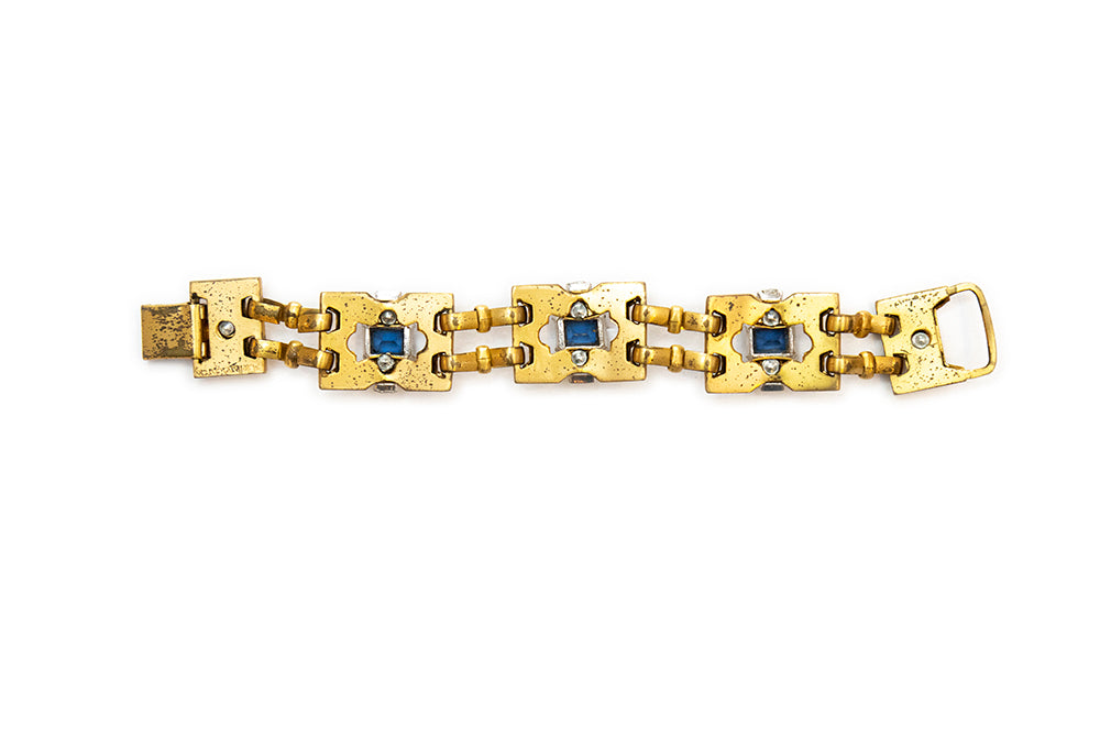 back view of late Art Deco McClelland Barclay gold plated with blue and clear rhinestone bracelet