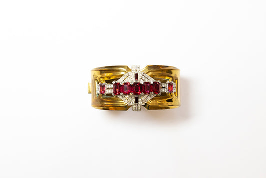 Art Deco hinged cuff bracelet by McClelland Barclay is embellished with red and clear rhinestones