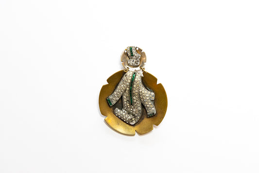 1940s Art Moderne McClelland Barclay brooch or pendant curled pavé rhinestone decoration with tiny green accent rhinestones. A vintage two-for-one jewelry piece