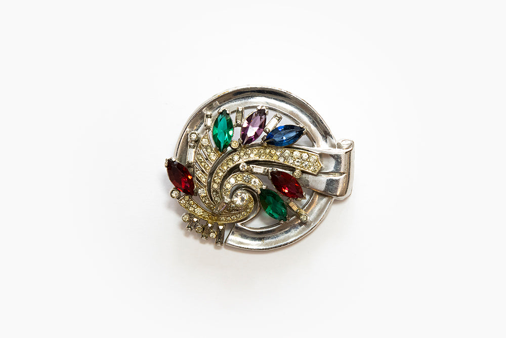 rare Art Moderne silvertone swirl brooch with multi-color navette stones by McClelland Barclay