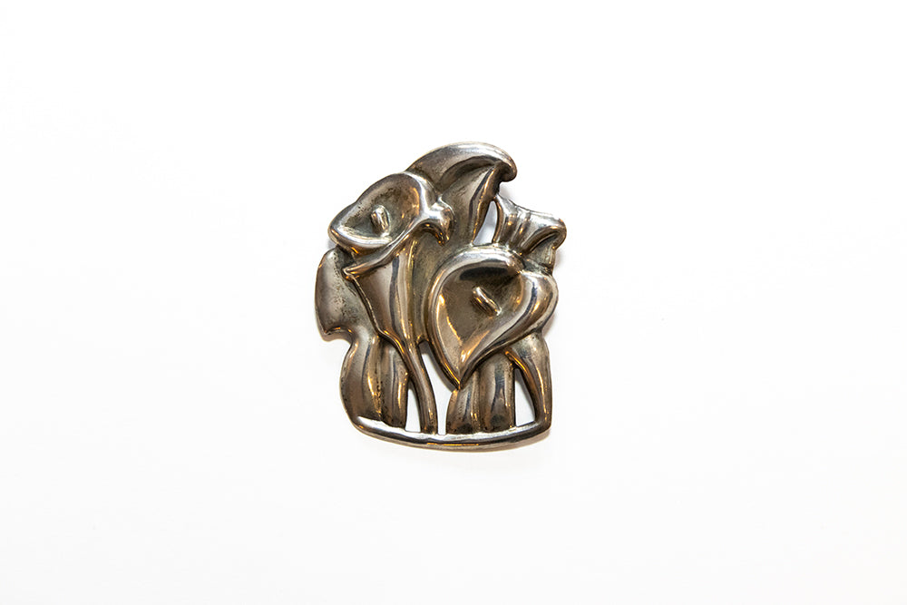 Vintage McClelland Barclay Sterling silver Art Deco lilies brooch made using the repoussé , or hammered technique visible since this brooch has with no back