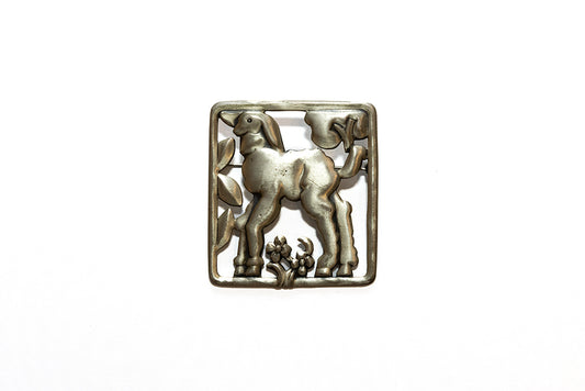 the feeling Spring is captured in this vintage McClelland Barclay sterling silver lamb brooch with square frame