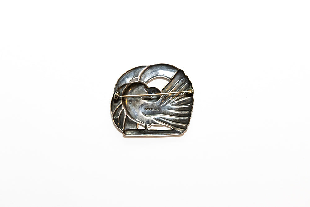 back view of McCLELLAND BARCLAY sterling silver Art Deco dove brooch shows the hammered-from-behind or repoussé technique