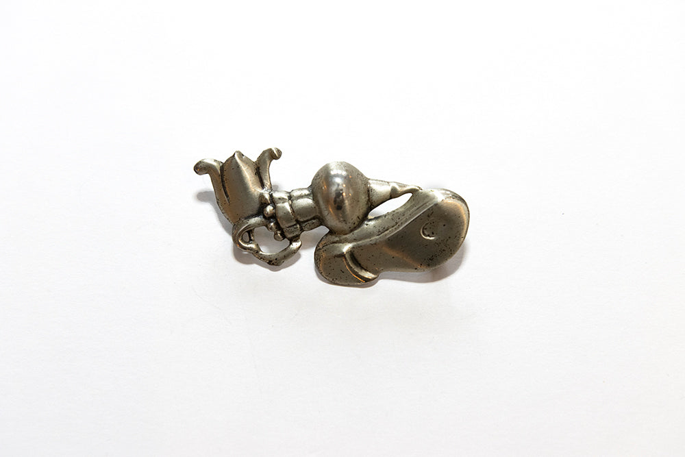 A vintage Art Deco Depression Era political themed sterling silver brooch by McClelland Barclay