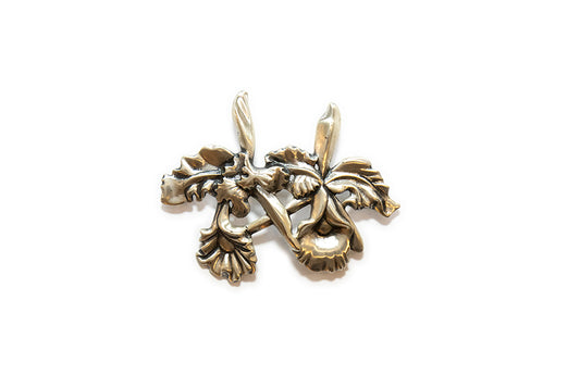 sterling sliver double orchid brooch by McClelland Barclay made with the repoussé technique